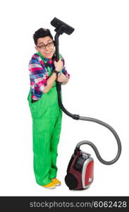 Funny man in green coveralls vacuum cleaning