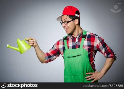 Funny man with watering can