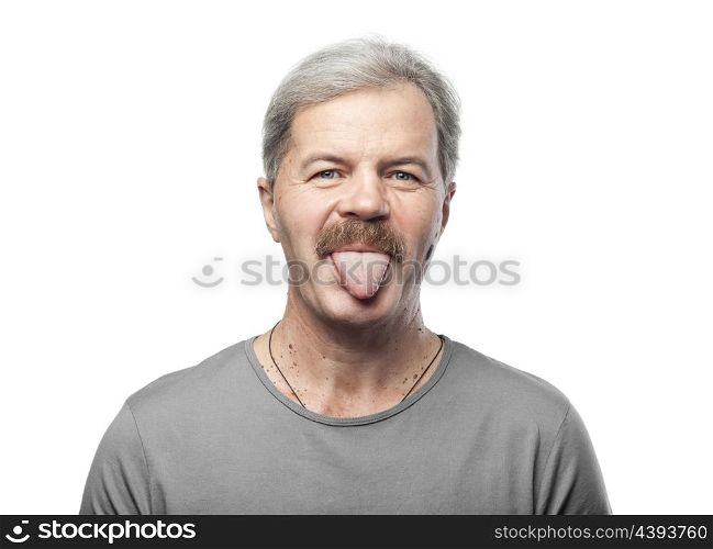 funny mature man shows tongue isolated on white background