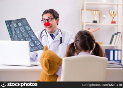 Funny pediatrician with little girl at regular check-up