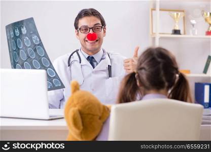 Funny pediatrician with little girl at regular check-up
