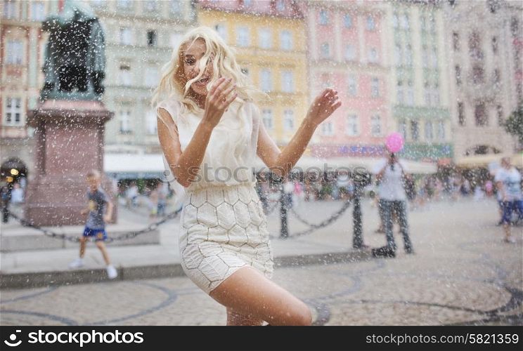 Funny photo of the wet blond woman