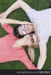 Funny picture of the lying couple with sunglasses