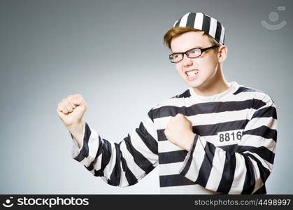 Funny prison inmate in concept