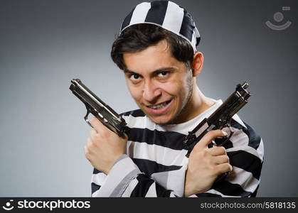 Funny prison inmate with gun