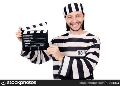 Funny prison inmate with movie board isolated on white