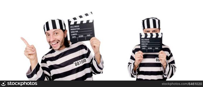 Funny prison inmate with movie board isolated on white