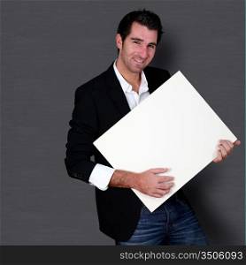 Funny salesman holding whiteboard