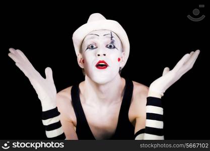 Funny screaming mime in white hat isolated on black background