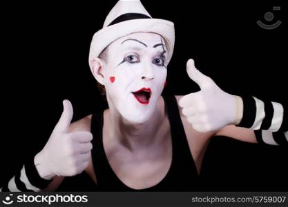 Funny screaming mime in white hat isolated on black background