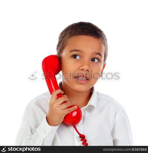 Funny small child talking on the phone isolated on a white background