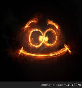 Funny smile icon. Glowing light smiley symbol on dark background