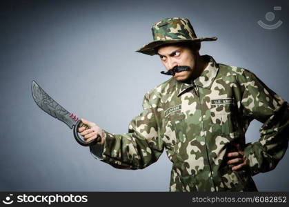 Funny soldier against the dark background