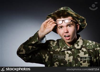 Funny soldier in military concept