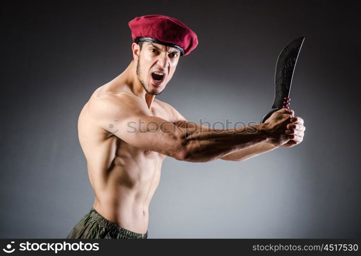 Funny soldier in military concept