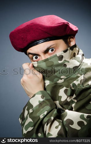 Funny soldier in military concept