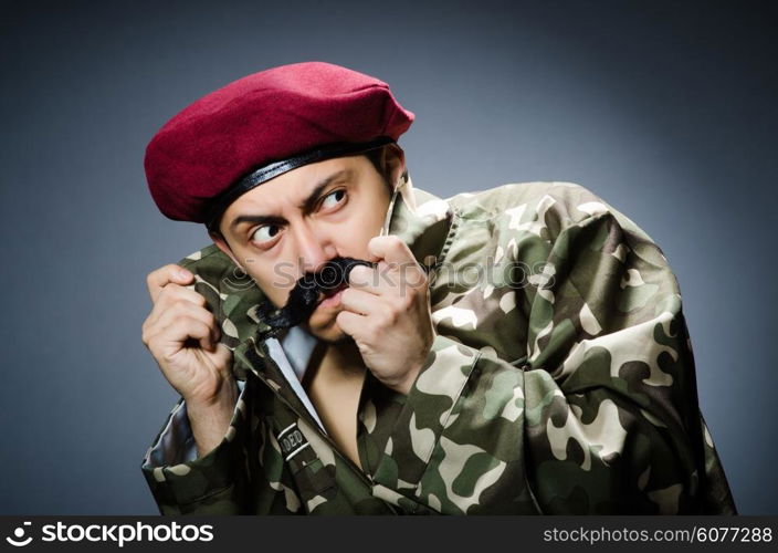 Funny soldier in military concept