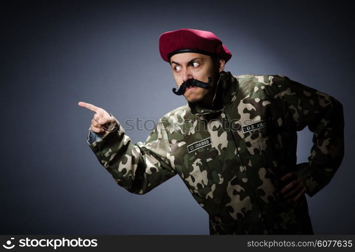 Funny soldier in military concept