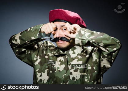 Funny soldier in military concept