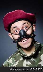 Funny soldier in military concept