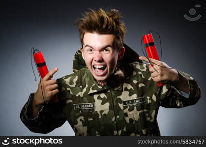 Funny soldier with red dynamite