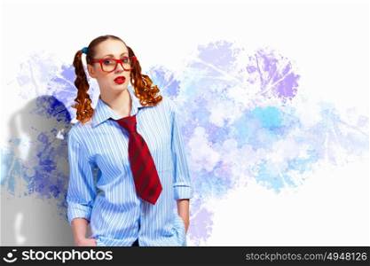 Funny teenager girl. Image of confident teenager girl in red glasses