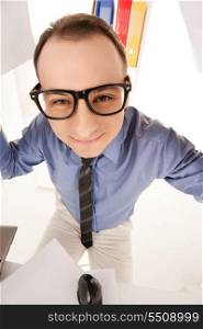 funny wideangle picture of businessman in office