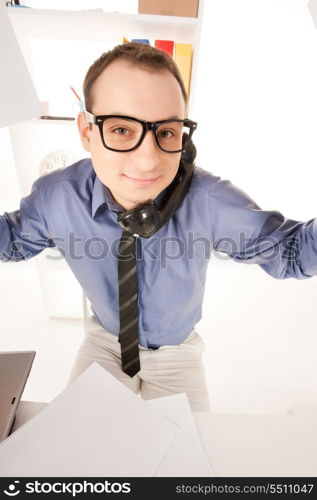 funny wideangle picture of businessman in office