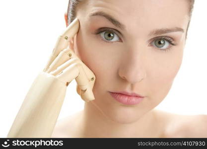 Funny woman cosmetic portrait, thinking with mannequin wooden hand