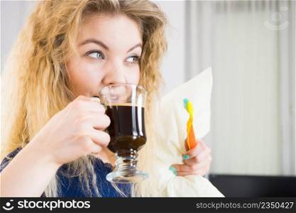 Funny woman holding black coffee and toothbrush being late. Getting morning energy, hurry up before going to work.. Funny woman being late drinking coffee