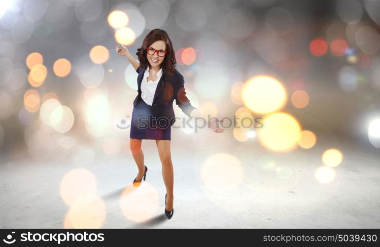 Funny woman in red glasses. Young funny woman in suit against bokeh background