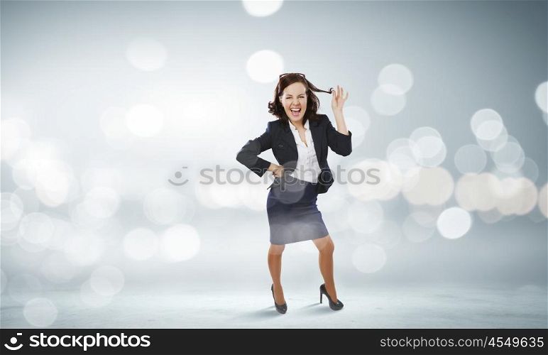 Funny woman in suit. Young funny woman in suit against bokeh background