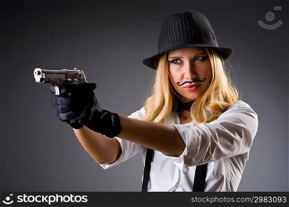 Funny woman with gun and mustache