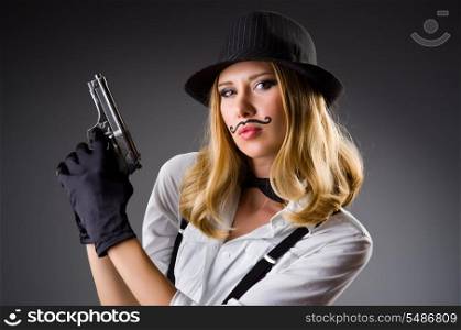 Funny woman with gun and mustache