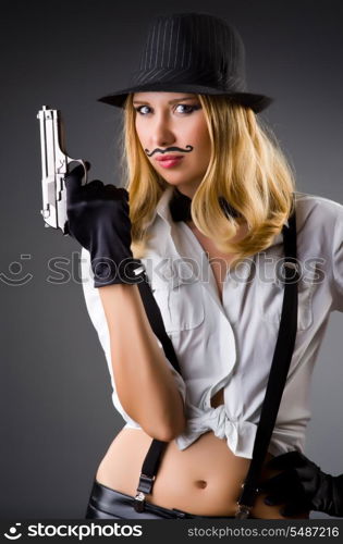 Funny woman with gun and mustache