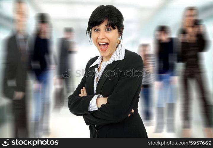 funny young business woman portrait with some people on the back