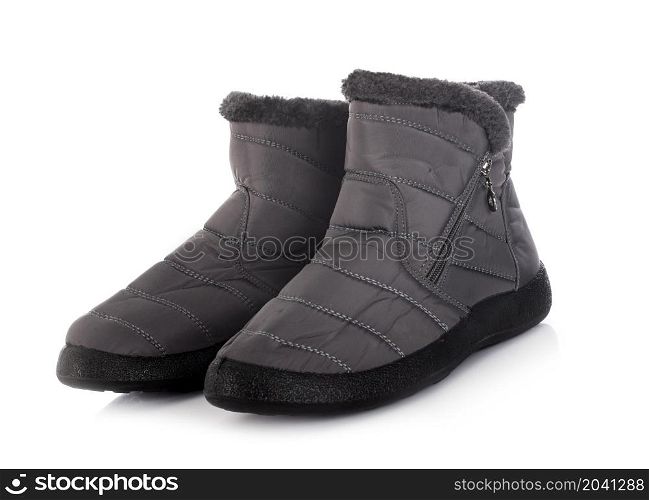 fur-lined boots in front of white background