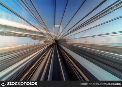 Furistic scene Motion blur movement from tokyo japan train of Yurikamome Line moving between tunnel in Tokyo, Japan