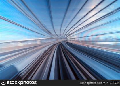 Furistic scene Motion blur movement from tokyo japan train of Yurikamome Line moving between tunnel in Tokyo, Japan