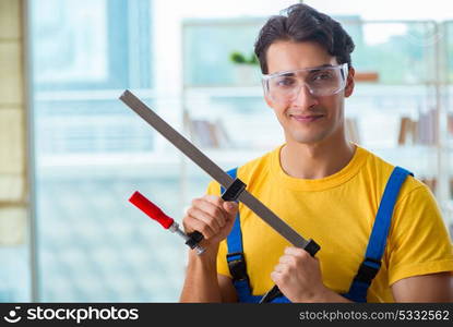 Furniture carpenter working in the workshop