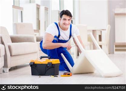 Furniture repairman working in store