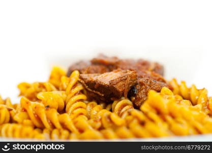 fusilli pasta al dente with neapolitan style ragu meat sauce very different from bolognese style