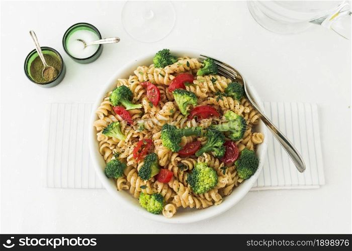 fusilli pasta salad with tomato broccoli napkin 2. Resolution and high quality beautiful photo. fusilli pasta salad with tomato broccoli napkin 2. High quality beautiful photo concept
