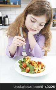 Fussy Girl With Healthy Meal At Home