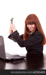 Fustrated businessman in her office threatening to destroy her PC with a hammer out of sheer frustration