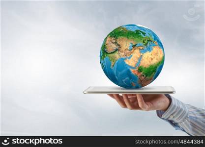 Future of our planet in your hands. Close up of human hands holding Earth planet. Elements of this image are furnished by NASA