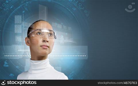 Future technologies. Young pretty asian woman touching digital hologram