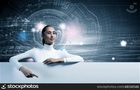 Future technologies. Young pretty woman with white blank banner