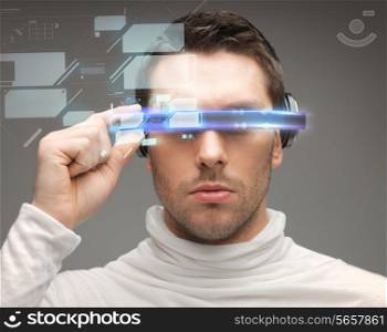 future, technology and people concept - man in futuristic glasses