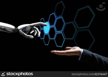 future technology, artificial intelligence and business concept - human hand and robot touching virtual network hologram over black background. human hand and robot touching network hologram